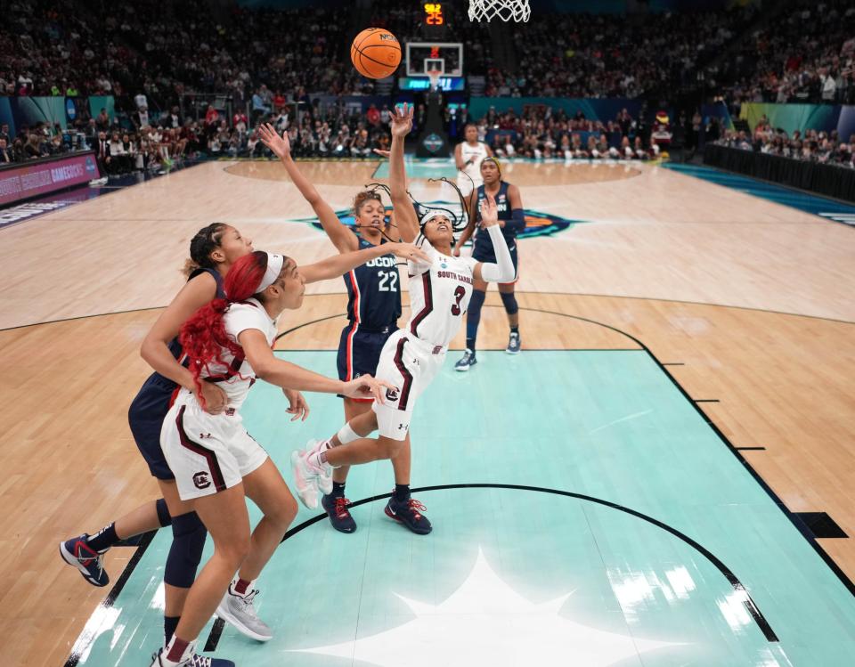 Apr 3, 2022; Minneapolis, MN, USA; South Carolina Gamecocks guard Destanni Henderson (3) goes up for a layup against the UConn Huskies during the first half in the Final Four championship game of the women's college basketball NCAA Tournament at Target Center. Mandatory Credit: Kirby Lee-USA TODAY Sports