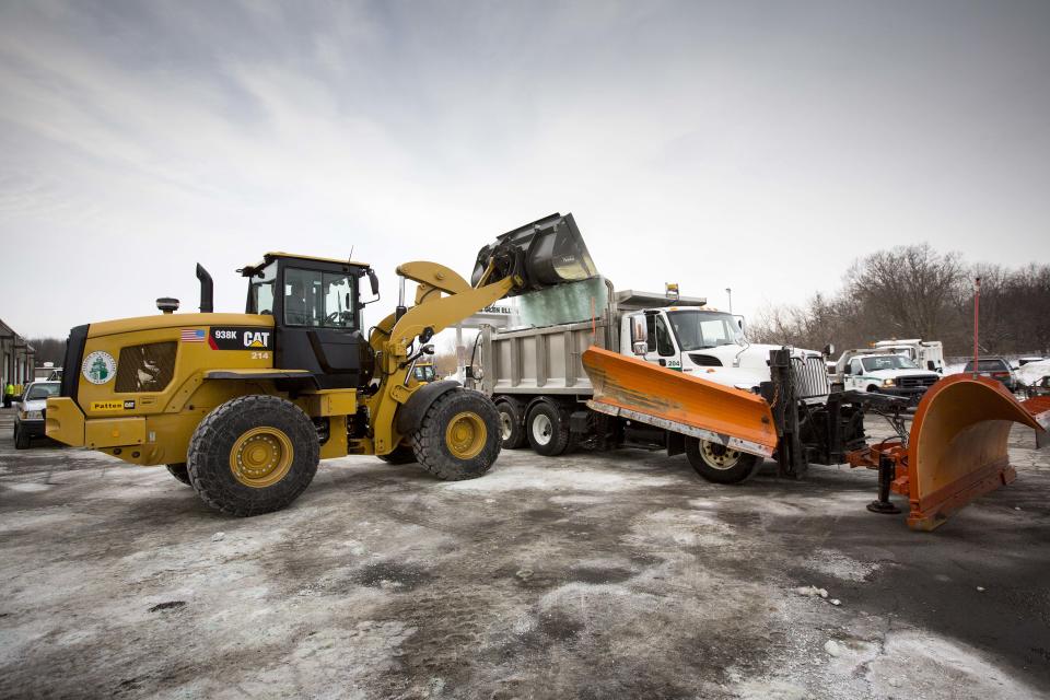 Road salt is loaded into a snow plow truck equipped with a salt spreader at the public works facility in Glen Ellyn, Ill., on Tuesday, Feb. 4, 2014. The Midwest's recent severe winter weather has caused communities to expend large amounts of their road salt supplies. (AP Photo/Andrew A. Nelles)