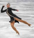 <p>Aiza Mambekova from Kazakhstan also wore a revealing dress when she took to the ice. It was completely split down the front, held by just a single piece of fabric at the end.</p>