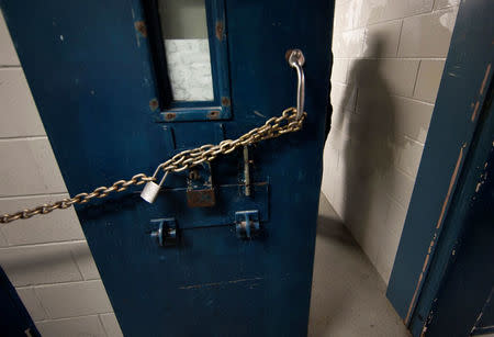 FILE PHOTO: A chain on a segregation cell is seen at the Kingston Penitentiary in Kingston, Ontario, Canada, October 11, 2013. REUTERS/Fred Thornhill/File Photo