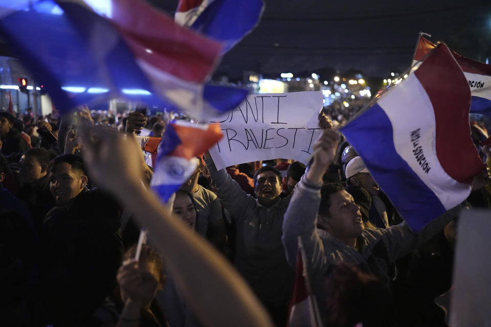 Supporters of National Crusade Party presidential candidate, Paraguayo Cubas, protest outside the Electoral Tribunal building, in Asuncion, Paraguay, Friday, May 5, 2023. Police on Friday detained Cubas, a far-right populist who came in third in Sunday’s presidential election and had alleged without evidence the vote was marred by fraud. (AP Photo/Jorge Saenz)