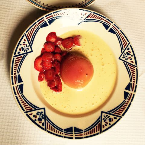 <p>Stephen Heyman</p> A dreamy summer peach dessert at Le Saint Eutrope in Clermont-Ferrand.
