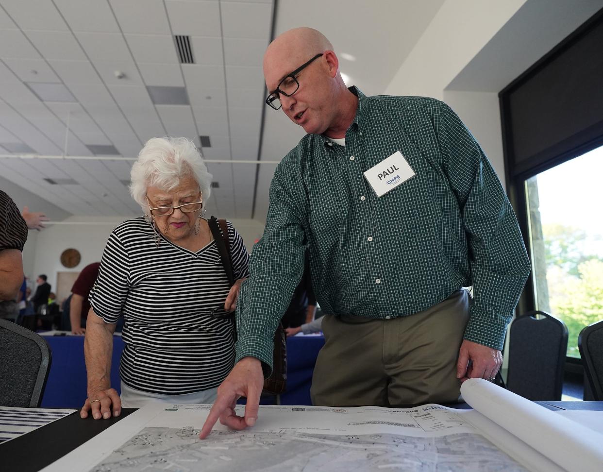 Stony Point property owner Patsy Duncan, left, talks with Paul Weske, Vice-President of Terrestrial Construction at Champlain Hudson Power Express during a pre-construction open house at the Patriot Hills Senior & Community Center in Stony Point on Wednesday, May 8, 2024. Champlain Hudson Power Express, a hydropower generation line that will stretch from Canada to Queens.