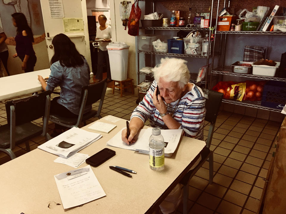 Sister Caroline Sweeney, a volunteer, makes calls to the families of recent arrivals in Casa Vides in El Paso, Texas in August 2019. | Courtesy of Lily Moore-Eissenberg