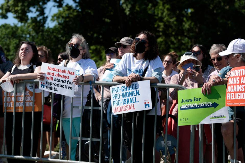 <span class="caption">Protesters listen during the 2022 Jewish Rally for Abortion Justice in Washington, D.C.</span> <span class="attribution"><a class="link " href="https://www.gettyimages.com/detail/news-photo/protesters-listen-during-the-jewish-rally-for-abortion-news-photo/1397755650?adppopup=true" rel="nofollow noopener" target="_blank" data-ylk="slk:Anna Moneymaker/Getty Images;elm:context_link;itc:0;sec:content-canvas">Anna Moneymaker/Getty Images</a></span>