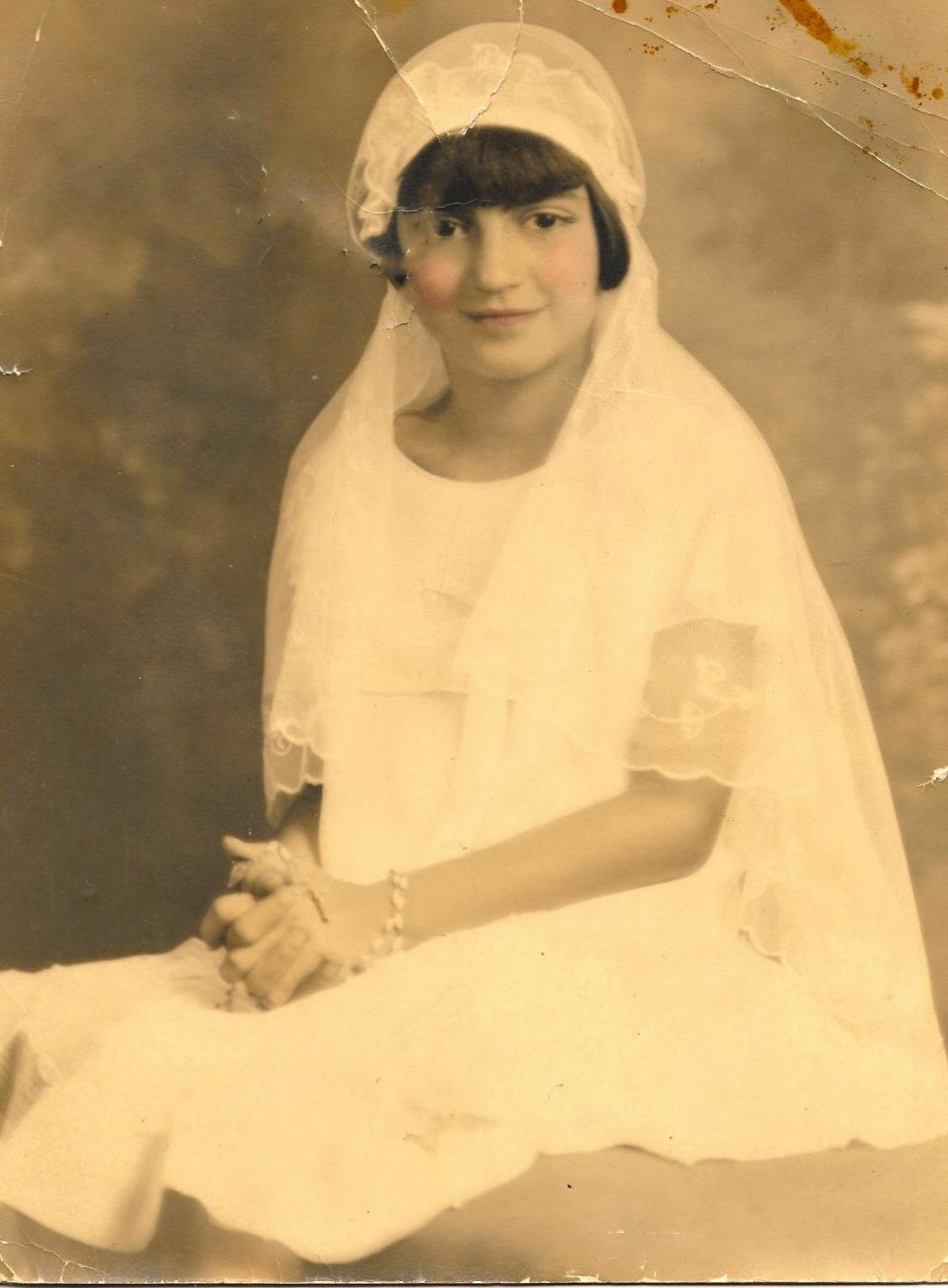 At age 8, Mildred "Millie" Moulton was confirmed at St. Anthony Parish in the Allston neighborhood in Boston on June 8, 1932.