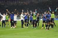 Inter Milan players celebrate at the end of the Champions League semifinal second leg soccer match between Inter Milan and AC Milan at the San Siro stadium in Milan, Italy, Tuesday, May 16, 2023. (AP Photo/Luca Bruno)