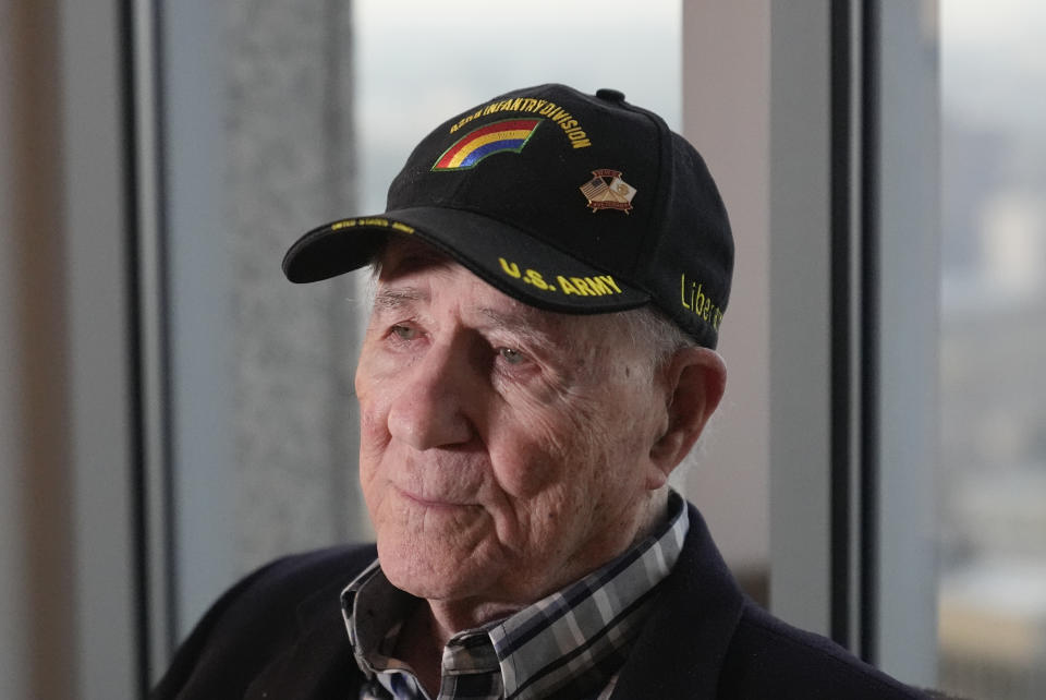 World War II veteran Hilbert Margol, speaks during an interview with the Associated Press on Thursday, March 14, 2024, in Atlanta. Margol is a 100-year-old World War II veteran living in Dunwoody, Ga. He and his twin brother, Howard Margol, were a part of the 42nd Infantry that arrived in Marseille, France, in January 1945. (AP Photo/Brynn Anderson)