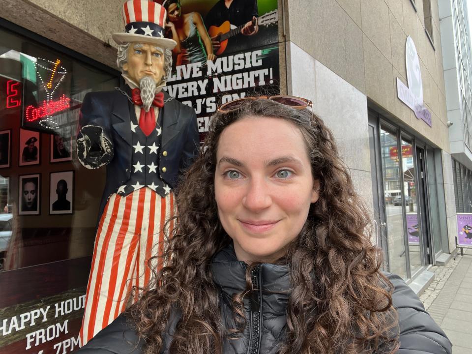 Talia Lakritz poses with an Uncle Same statue outside American Bar in Iceland