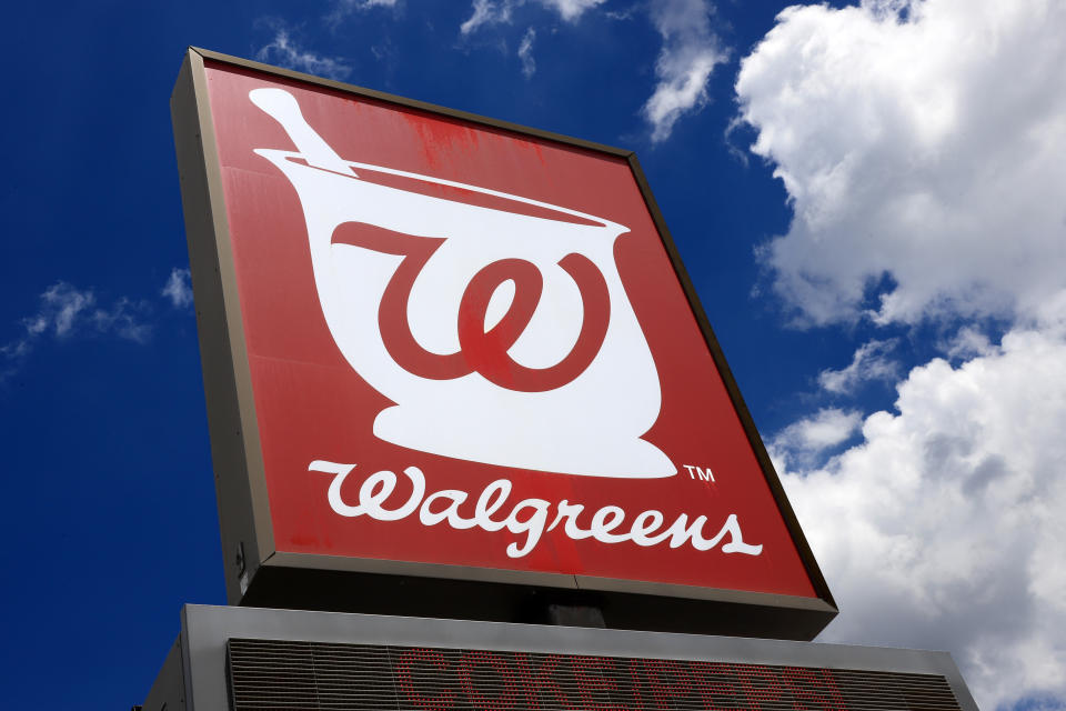 FILE - This June 25, 2019, file photo shows a sign outside a Walgreens Pharmacy in Pittsburgh. Walgreens will start flying packages by drone to residents in a Texas city in partnership with Google’s drone-making affiliate Wing. The companies said Wednesday, Oct. 20, 2021, they will begin testing the service next week in the city of Frisco and neighboring town of Little Elm, two fast-growing communities north of Dallas where road traffic is “probably the biggest complaint we get," said Frisco Mayor Jeff Cheney. (AP Photo/Gene J. Puskar, File)