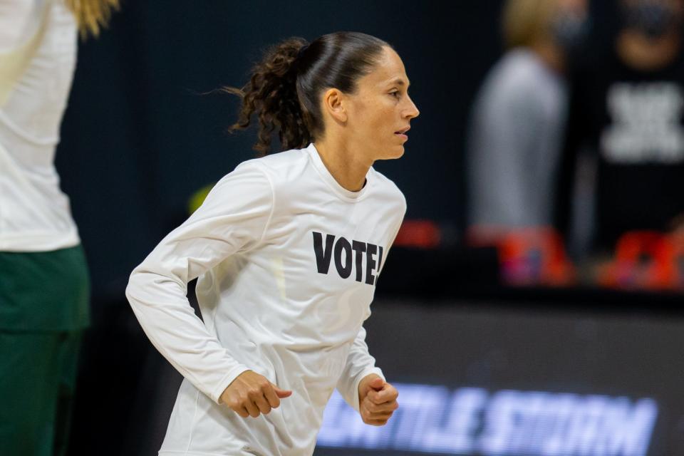 Sue Bird has taken an active role in social and political causes in recent years Here she wears a "Vote!" shirt before Game 2 of the 2020 WNBA semifinals.