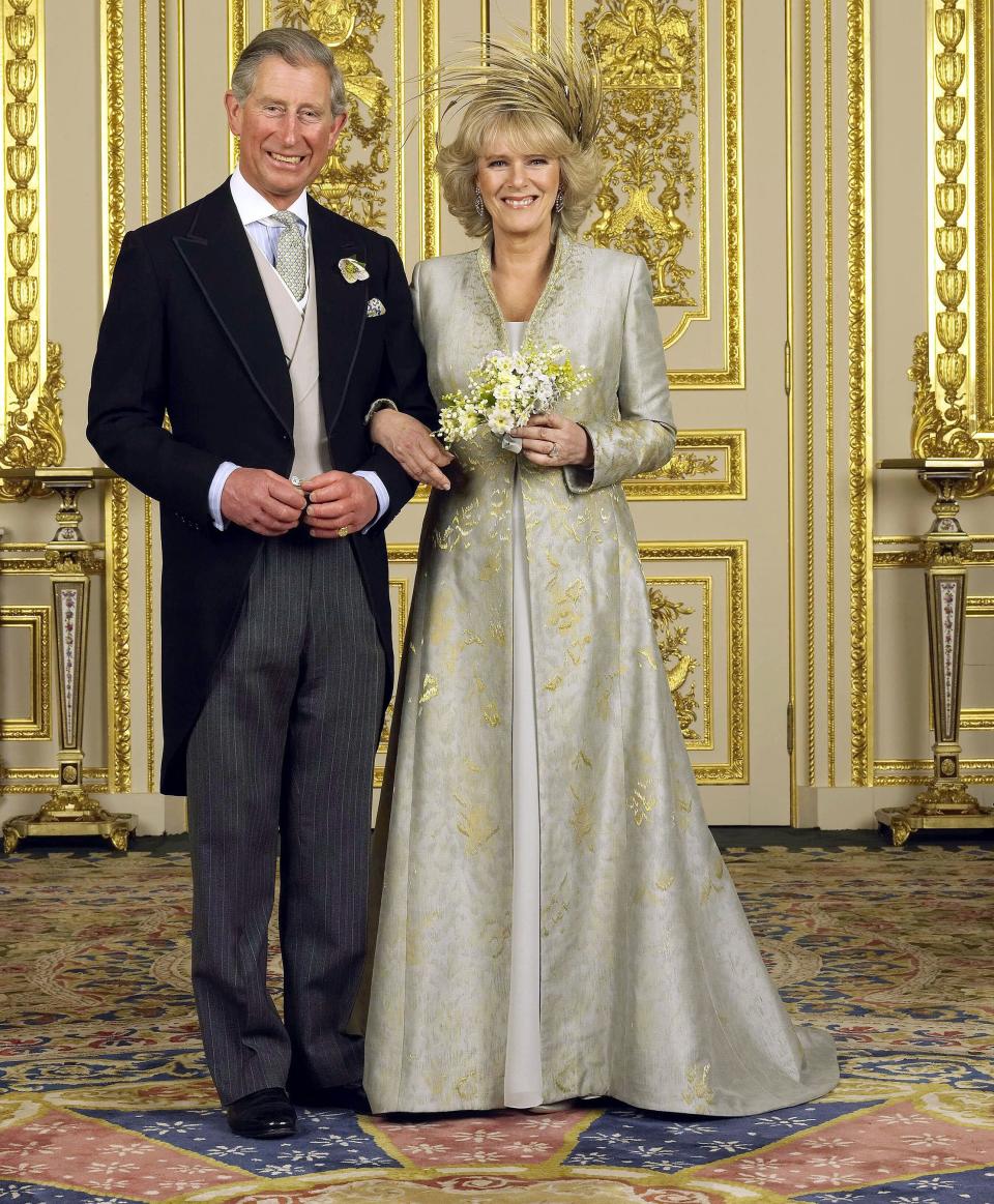 The newlyweds were all smiles after the ceremony in this photo taken in the White Drawing Room at Windsor Castle.