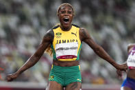 Elaine Thompson-Herah, of Jamaica, wins the women's 100-meter final at the 2020 Summer Olympics, Saturday, July 31, 2021, in Tokyo. (AP Photo/Martin Meissner)