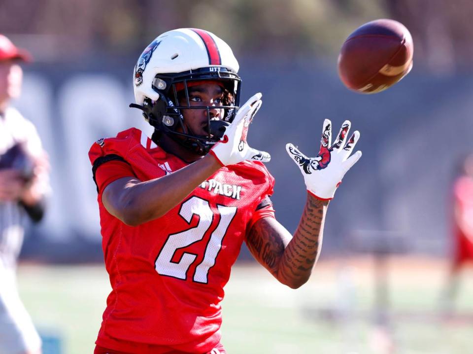 N.C. State wide receiver Jalen Coit (21) pulls in a pass during the first day of the Wolfpack’s spring football practice in Raleigh, N.C., Wednesday, March 2, 2022.