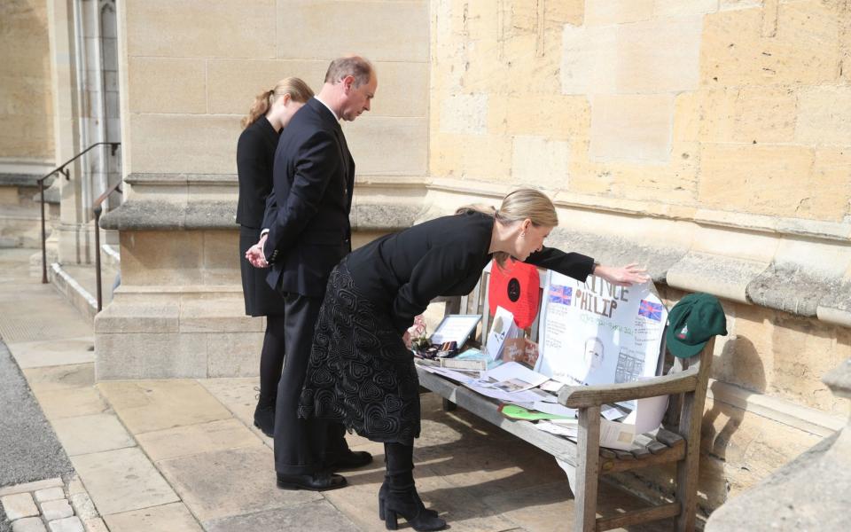 Lady Louise Windsor, Earl of Wessex and the Countess of Wessex view tributes outside St George's Chapel - Steve Parsons 