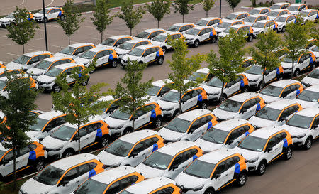 Yandex.Drive carsharing cars are seen at a parking lot in Moscow, Russia September 10, 2018. REUTERS/Maxim Shemetov