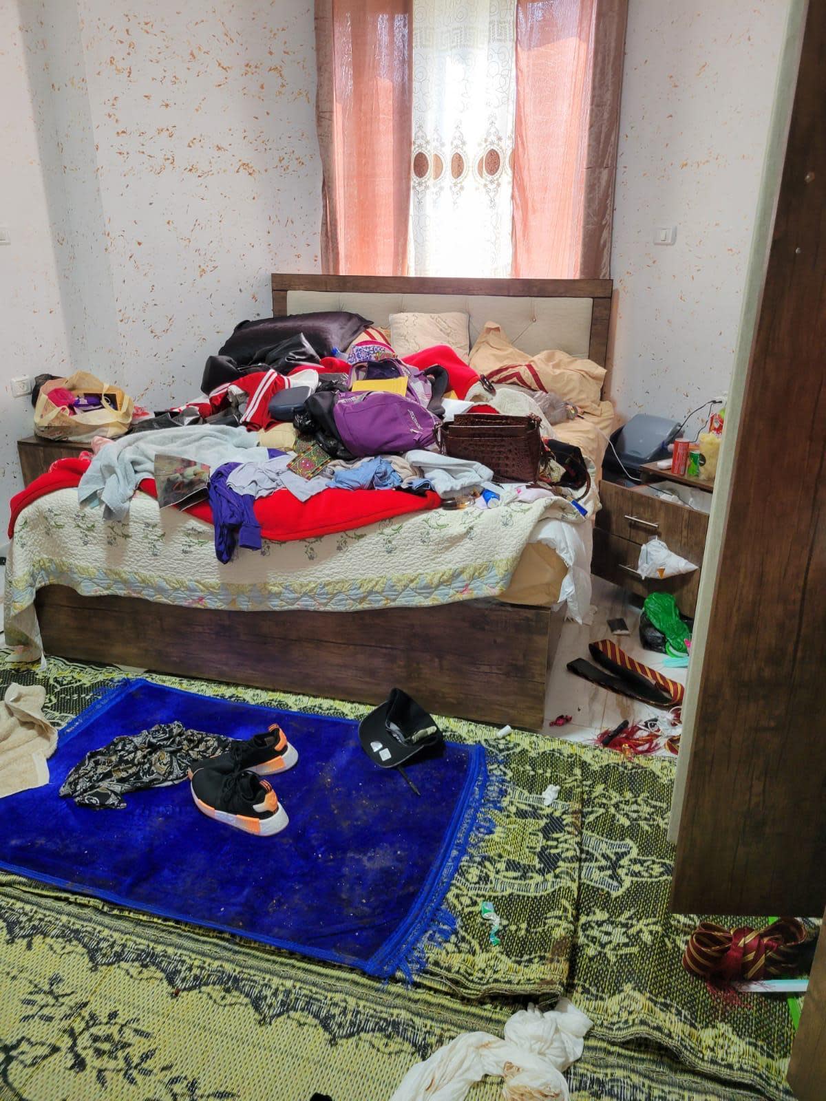 Pictures and videos shared with CBS News show the aftermath of Samaher Esmail's arrest in the family home in the town of Silwad, in the Israeli-occupied West Bank, which left windows broken and belongings strewn across a bedroom.  / Credit: Photo provided by Samaher Esmail's family