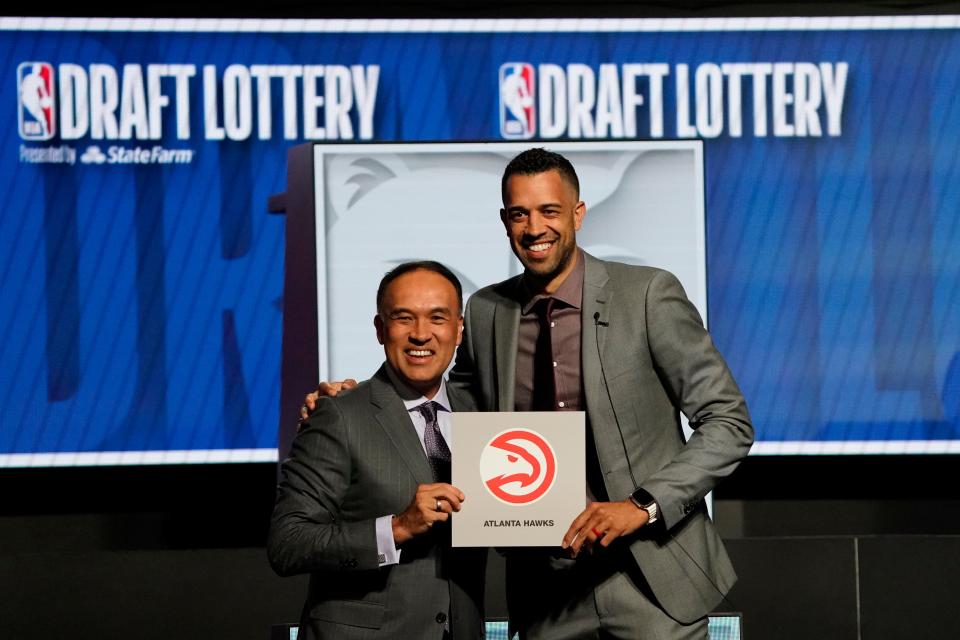 Atlanta Hawks general manager Landry Fields (right) and Mark Tatum Deputy commissioner of the NBA after the Hawks get the number one pick in the 2024 NBA Draft Lottery at McCormick Place West.