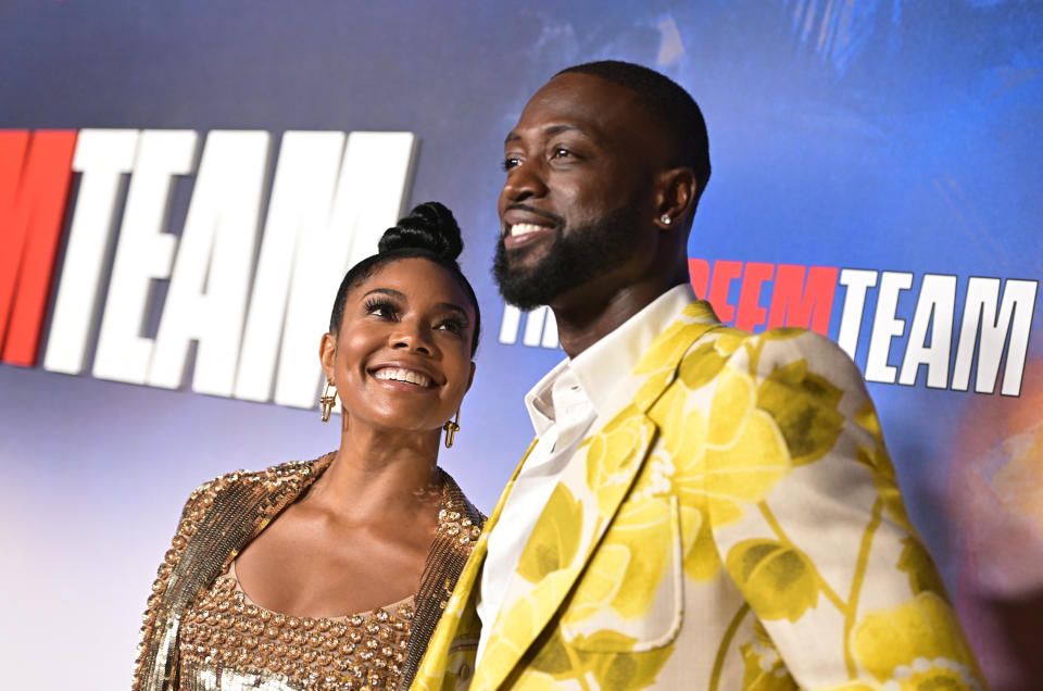 Gabrielle Union and Dwyane Wade smiling.