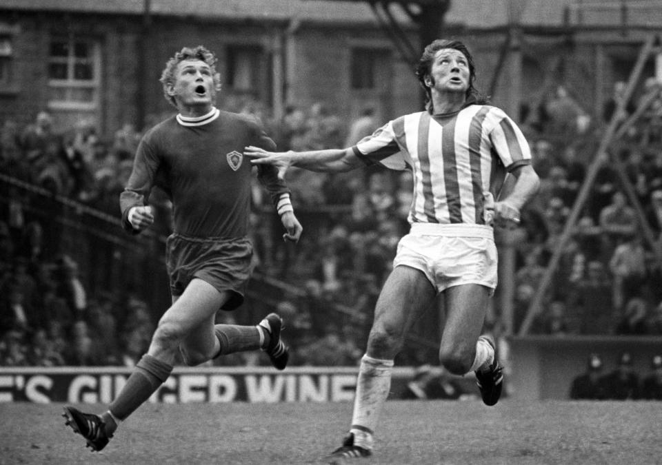 Frank Worthington (right) watches the ball with Leicester's John Sjoberg in August 1971