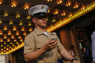 <p>A Marine checks his mobile phone as he walks around Times Square during Fleet Week on May 25, 2016, in New York City. Nearly 4,500 sailors, Marines and Coast Guardsmen will participate during Fleet Week New York (FWNY) this year. General-public ship tours will be conducted daily throughout the week in Manhattan, Brooklyn and Staten Island. (Eduardo Munoz Alvarez/Getty Images) </p>