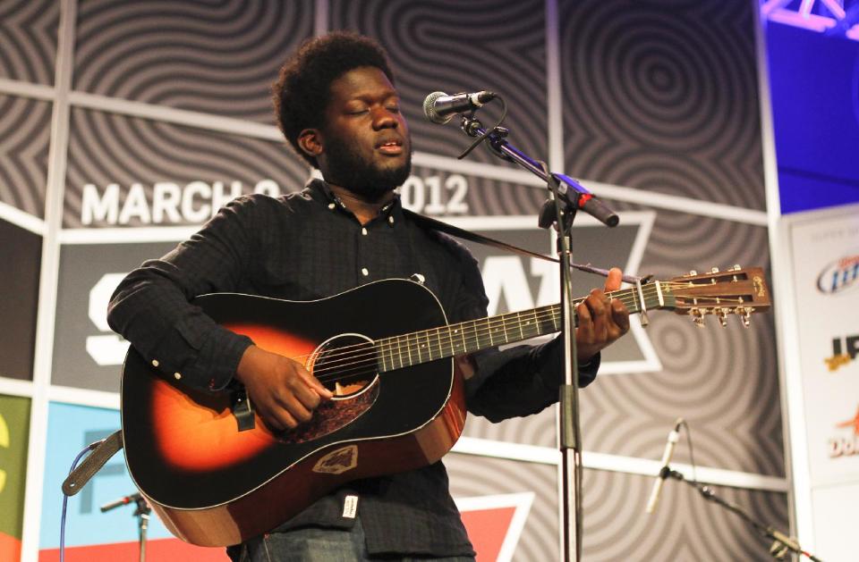 FILE - In this Wed., March 14, 2012 file photo, British soul singer Michael Kiwanuka performs at the SXSW Music Festival in Austin, Texas. Kiwanuka, who was voted BBC's Best of Sound 2012, prepares to play his first Bonnaroo Music & Arts Festival, in Manchester, Tenn. The music festival runs June 7-10, 2012. (AP Photo/Jack Plunkett, File)