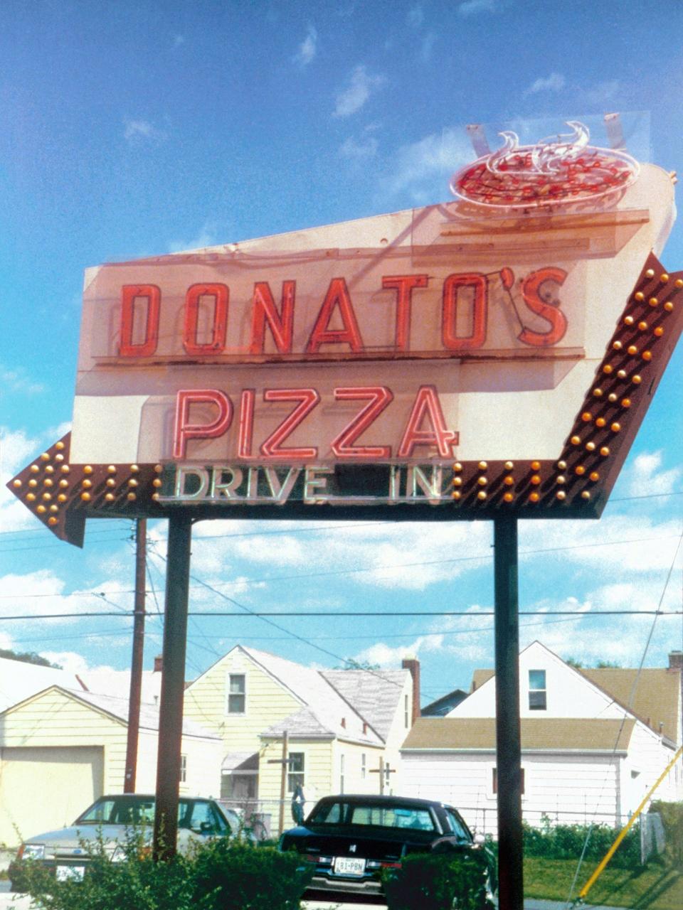 An updated version of the original Donatos sign still stands at 1000 Thurman Ave. on the South Side. Founder Jim Grote bought the house behind the restaurant for his family.
