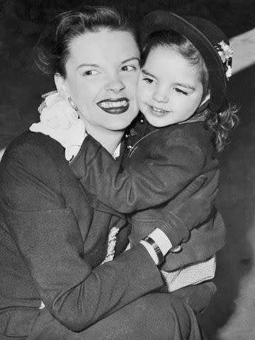 <p>Bettmann</p> Judy Garland and Liza Minnelli