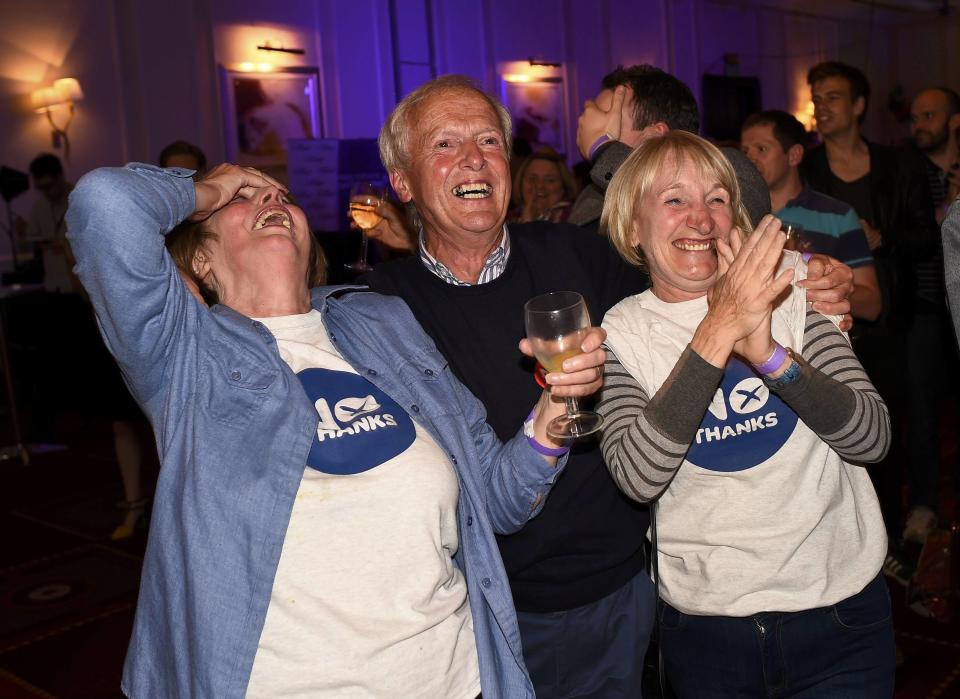 Supporters from the "No" Campaign react to a declaration in their favour, in Glasgow, Scotland