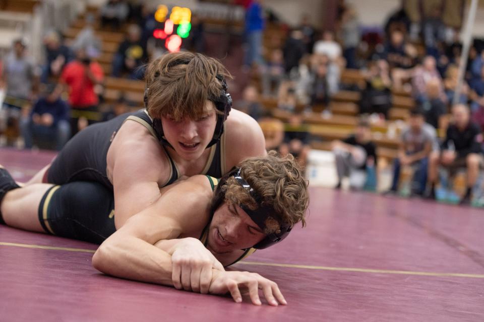 Arlington's Xavier Realmuto, top, wrestles FDR's Tray Bilyou, bottom at the 57th Mid-Hudson wrestling Tournament in LaGrange, NY on December 28, 2023.