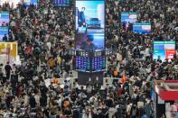 Passengers wait to board trains at Shanghai Hongqiao railway station ahead of the five-day Labour Day holiday, in Shanghai