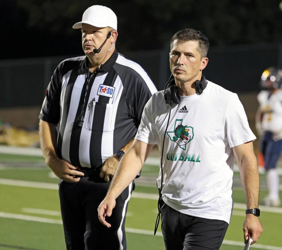 Carroll head coach Riley Dodge returns to the sidelines after arguing a no call with officials in the first half of an UIL football game at Dragon Stadium in Southlake, Texas, Friday Aug. 25, 2023. Southlake led Eastwood 42-14 at the half. (Special to the Star-Telegram Bob Booth)