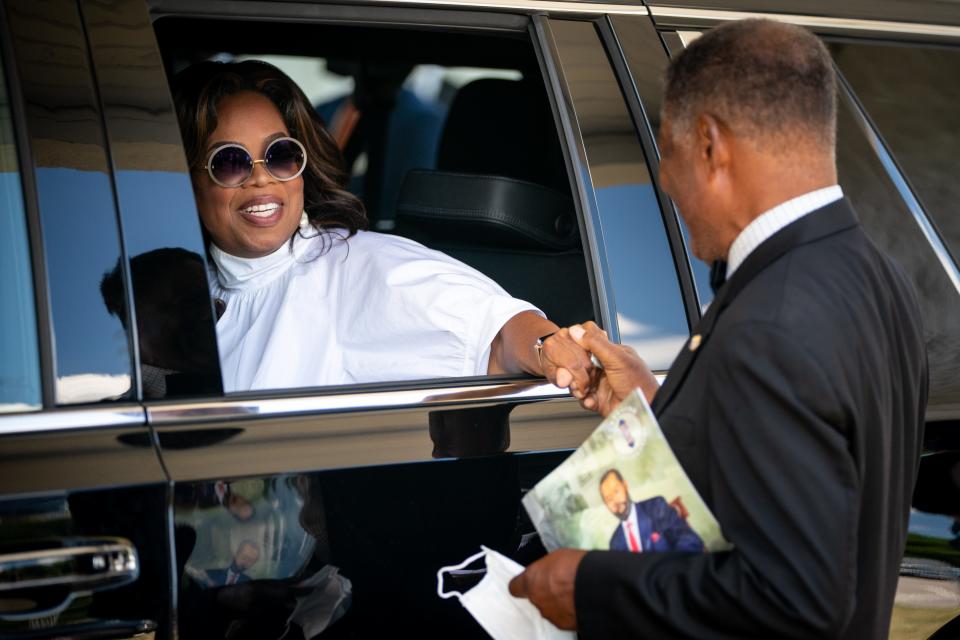 Oprah Winfrey greets family friend Ludye Wallace after the funeral for Vernon Winfrey, her father, at Temple Church in Nashville, Tenn., Thursday, July 14, 2022. Winfrey, former Nashville Metro councilman and Oprah Winfrey's father, died July 8th.