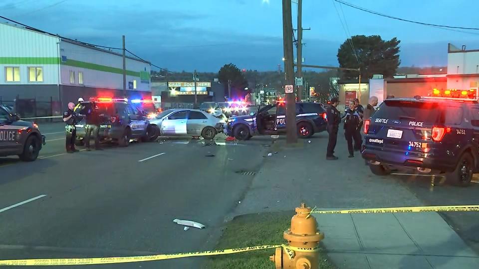 Seattle police said the crash happened during the recovery of a stolen car and a suspect is in custody.