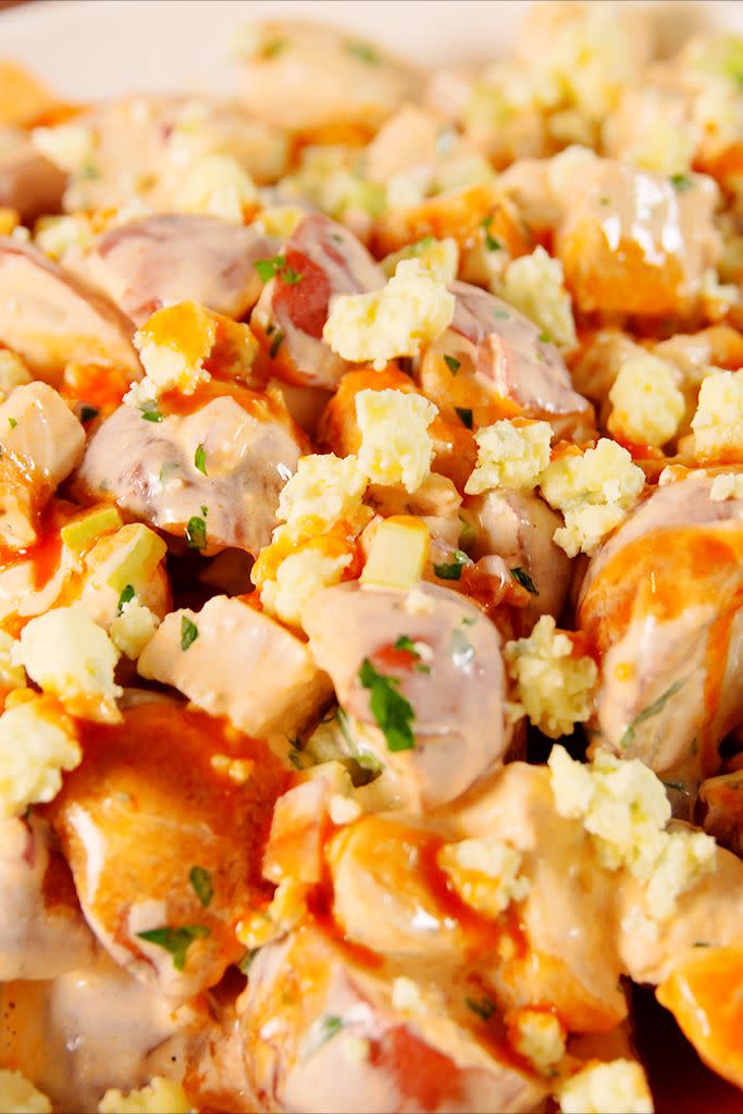 <p>Your next BBQ needs this.</p><p>Get the recipe from <a href="https://www.delish.com/cooking/recipe-ideas/recipes/a52542/buffalo-chicken-potato-salad-recipe/" rel="nofollow noopener" target="_blank" data-ylk="slk:Delish;elm:context_link;itc:0;sec:content-canvas" class="link ">Delish</a>.</p>