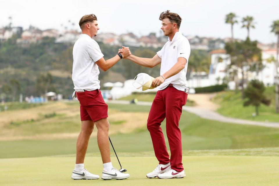 Luke Clanton of the Florida State Seminoles celebrates with teammate Tyler Weaver of the Florida State Seminoles after winning his match against the Georgia Tech Yellow Jackets in the semifinals during the Division I Men’s Golf Championship held at Omni La Costa Resort & Spa on May 28, 2024 in Carlsbad, California. (Photo by C. Morgan Engel/NCAA Photos via Getty Images)