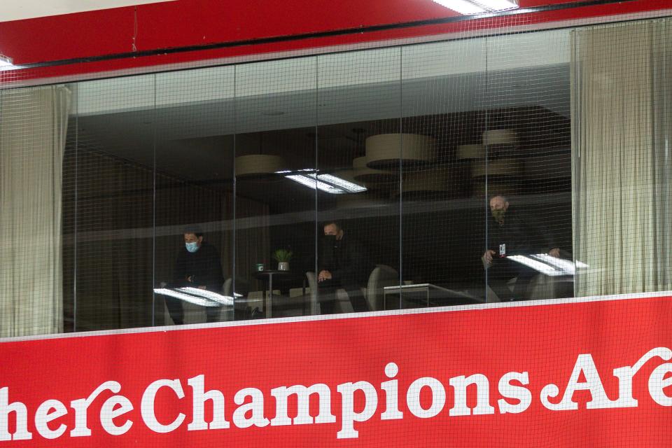 Detroit Red Wings GM Steve Yzerman, center, watches the first training camp practice at the Little Caesars Arena practice rink, Jan. 1, 2021.