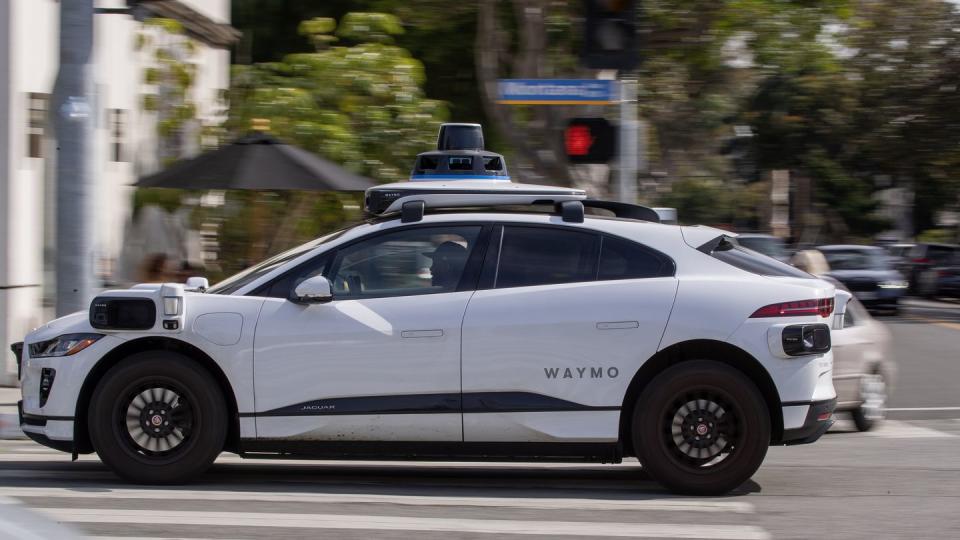 self driving waymo cars on the road in santa monica