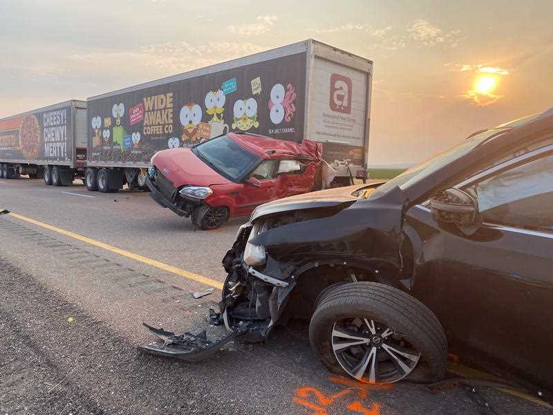 This photo provided by the Utah Highway Patrol and posted on the Utah Department of Public Safety website shows several of the vehicles involved in a fatal pileup, Sunday, July 25, 2021, on Interstate 15 in Millard County, near the town of Kanosh, Utah.