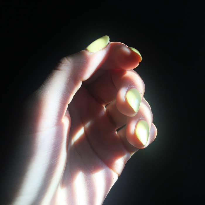 close up image of gel manicured nails