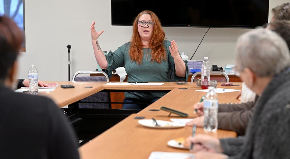 Amanda Bebrin, representing Leadership Cape Cod, guides the Housing Assistance Corporation training Thursday in Hyannis. About 12 people attended to learn how to deliver successful public comment in support of the region's housing needs.