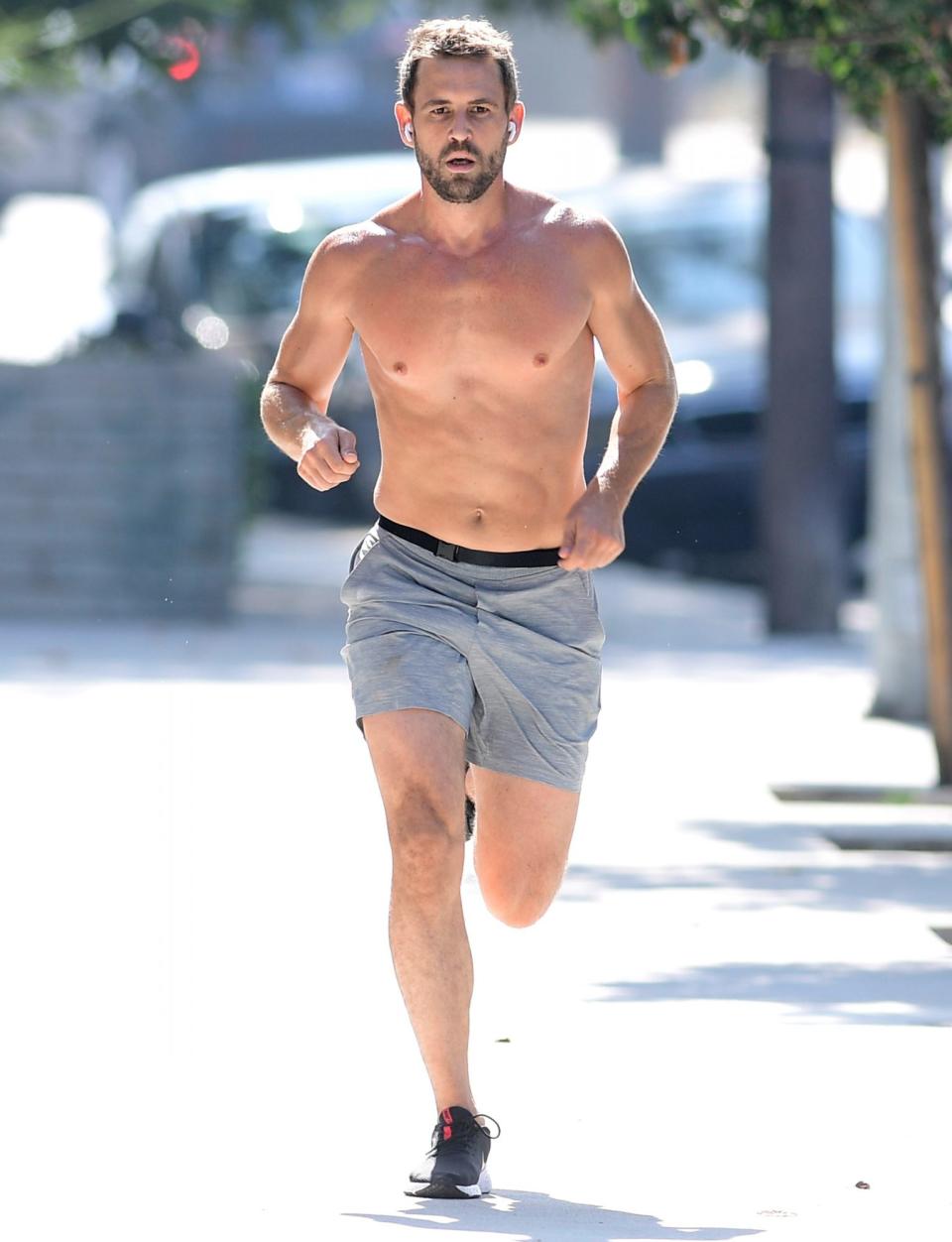 <p>Nick Viall works up a sweat while out for a shirtless run in L.A. on Tuesday. </p>