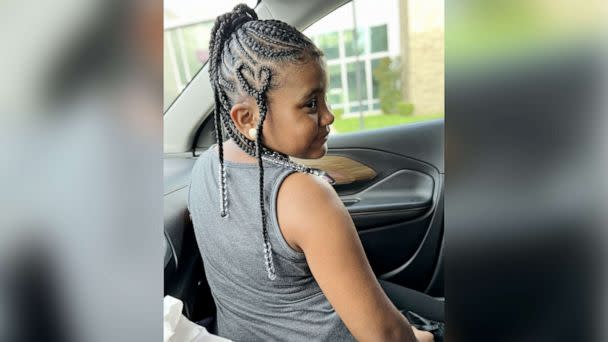 PHOTO: 5th-grader Sarah Craig exits her family's car on the first day of school this year in Louisville, Ky. (Latascha Craig)