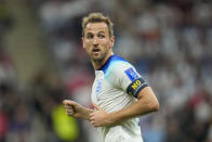 England's Harry Kane runs on the pitch during the World Cup group B soccer match between England and The United States, at the Al Bayt Stadium in Al Khor , Qatar, Friday, Nov. 25, 2022. (AP Photo/Julio Cortez)