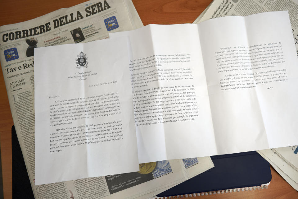 Reproduction of a three-page letter that Italian newspaper Corriere della Sera reported was written from Pope Francis to Venezuelan President Nicolas Maduro, in Rome, Wednesday, Feb. 13, 2019. Italian newspaper Corriere della Sera reported that Pope Francis has written a letter to Venezuelan President Nicolas Maduro indicating conditions aren't ripe for the Vatican to step in and help mediate in the country's political crisis. (AP Photo/Andrew Medichini)