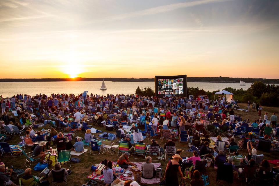 Watch a movie outdoors with a crowd.