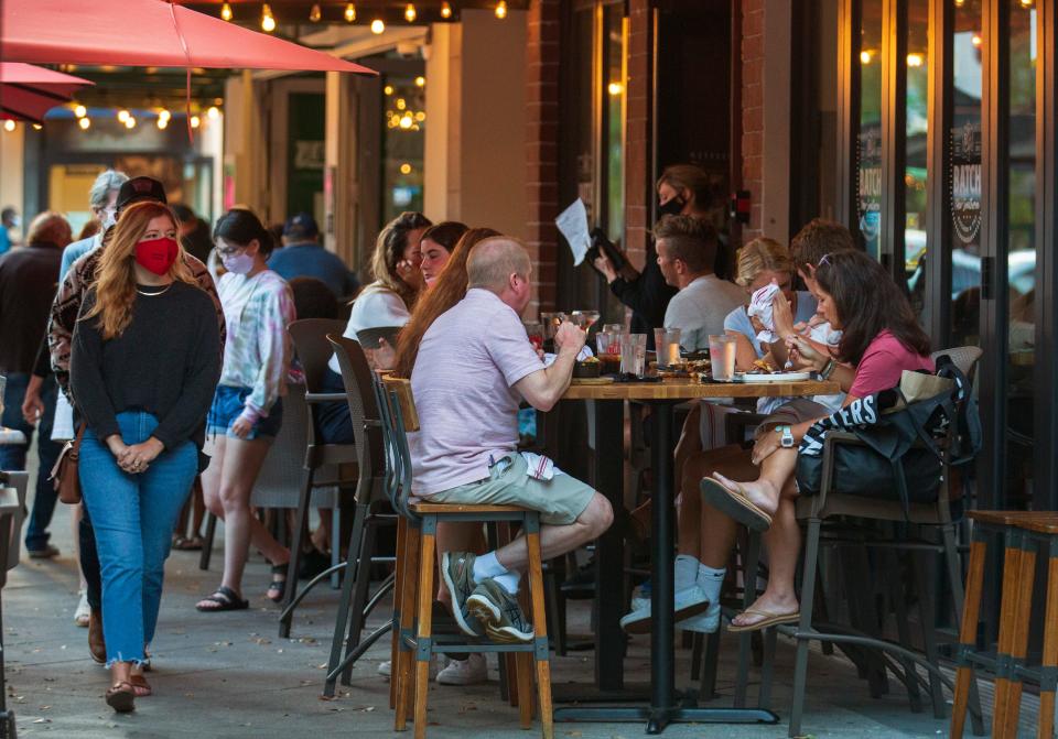 People dine at Batch on Clematis Street in downtown West Palm Beach.