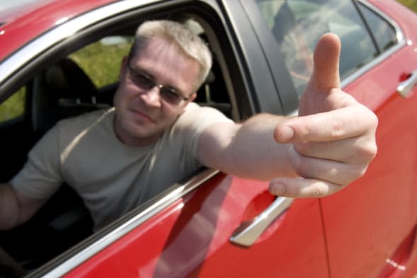 the angry driver shows gesture