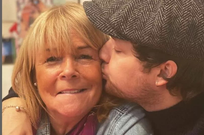 Linda Robson with her son