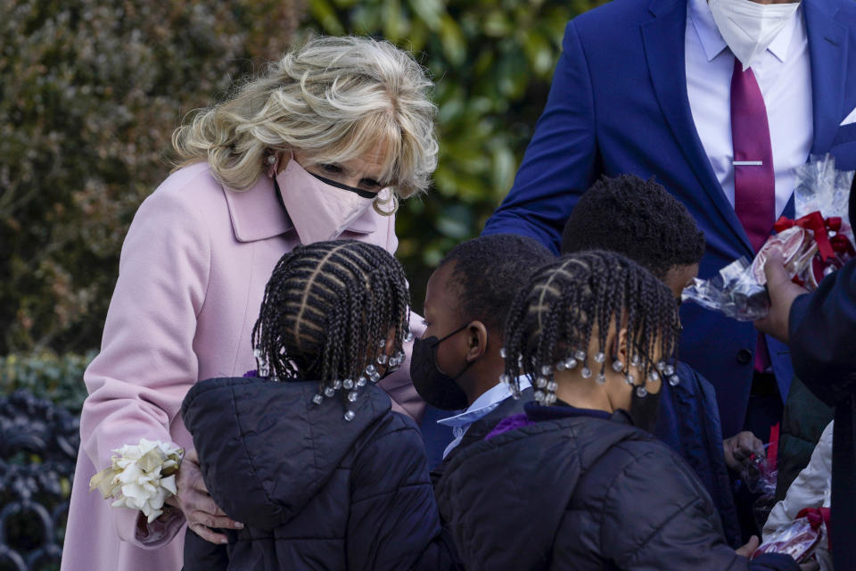 First lady Jill Biden talks with Aiton Elementary School students as she welcomes school children to the White House in Washington, Monday, Feb. 14, 2022, to celebrate Valentine's Day. (AP Photo/Susan Walsh)